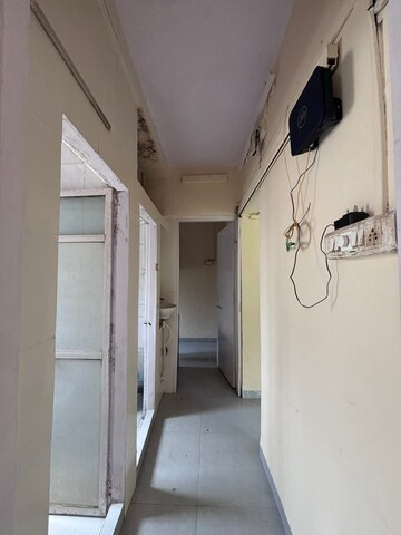 Building Lobby in 1 BHK Apartment at Seven Bunglow – for Rent