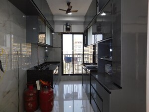 Kitchen in 3 BHK Apartment at Kamla Prasanna Jeevan, Borivali West – for Sale