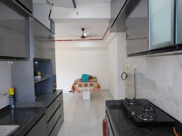 Kitchen in 3 BHK Apartment at Kamla Prasanna Jeevan, Borivali West – for Sale
