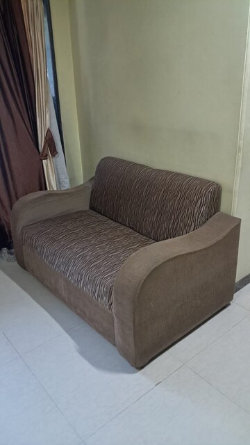Living Room in 1 BHK Apartment at Vastu Residency, Borivali East – for Rent