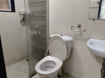 Bathroom in 1 BHK Apartment at Spring Grove Uno Society, Kandivali East – for Rent