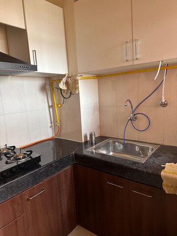 Kitchen in 1 BHK Apartment at Wave Dream Homes, Wave City – for Rent
