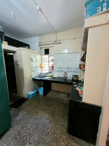 Kitchen in 1 BHK Apartment at Colonial Hearth, Model Colony – for Rent