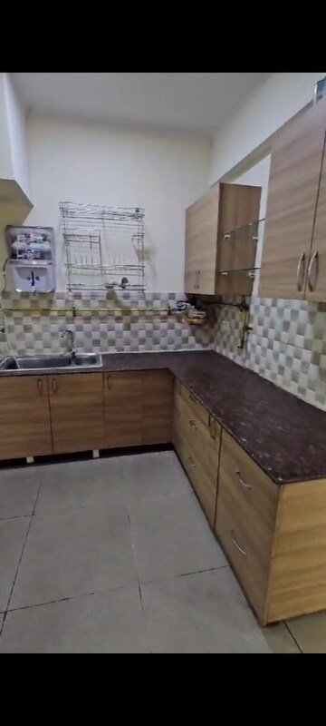 Kitchen in 2 BHK Apartment at Gaur City 2 - 16th Avenue, Sector 16c Greater Noida – for Rent