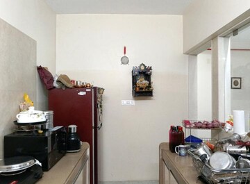Kitchen in 2 BHK Apartment at Dosti West County, Balkum Pada – for Rent