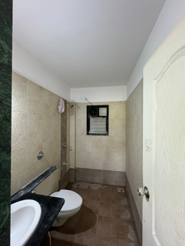 Bathroom, kolte-patil-umang-premiere 2 Bedroom 750 Sq.Ft. Apartment In Wagholi Pune 8669299