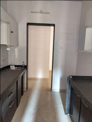 Kitchen in 2 BHK Apartment at Rustomjee Urbania Azziano L Wing, Majiwada – for Sale