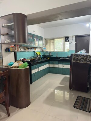 Kitchen in 2 BHK Apartment at Gera Foliage, Viman Nagar – for Sale