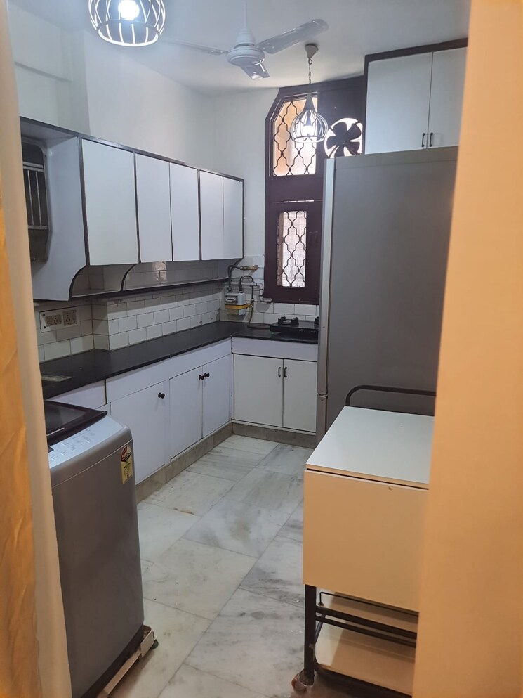 Kitchen, chirag enclave 2 Bedroom 180 Sq.Yd. Builder Floor In Chirag Enclave Delhi 8669311