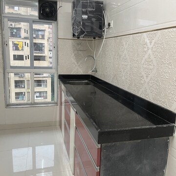 Kitchen in 1.5 BHK Apartment at Runwal Forests, Dockyard Colony – for Rent