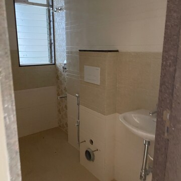 Bathroom in 1.5 BHK Apartment at Runwal Forests, Dockyard Colony – for Rent