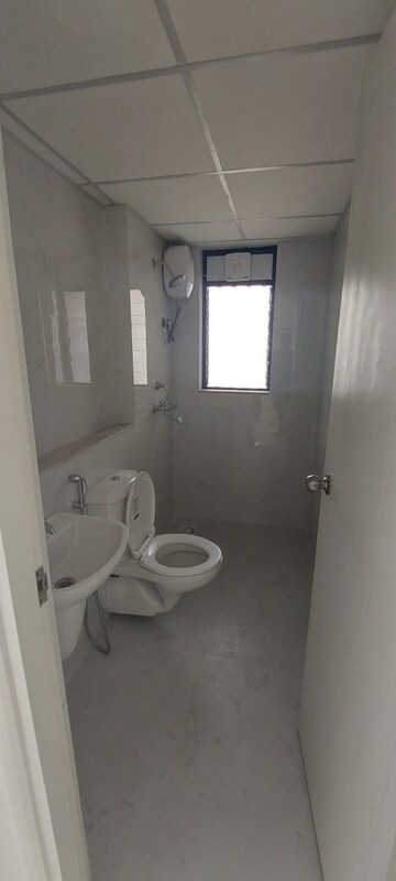 Bathroom in 3 BHK Apartment at Runwal Gardens Phase I, Dombivli East – for Rent
