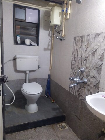 Bathroom in 2 BHK Apartment at Lotus Sky Garden, Malad West – for Sale