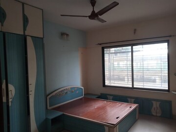 Bedroom in 2 BHK Apartment at Ajmera Girnar, Wadala – for Rent