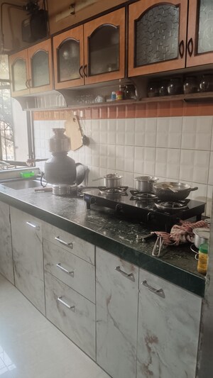 Kitchen in 1 BHK Apartment at Highland Residency CHSL, Balkum Pada – for Sale