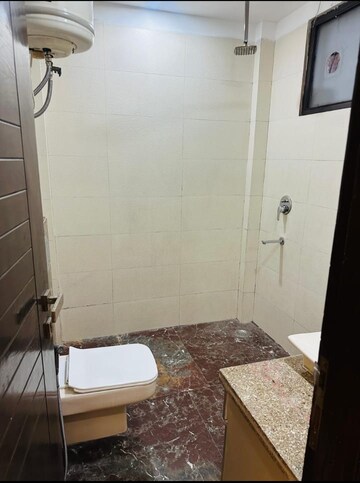 Bathroom in 3 BHK Apartment at South Extension I – for Sale