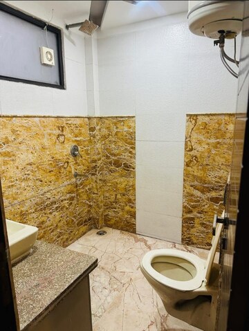 Bathroom in 3 BHK Apartment at South Extension I – for Sale