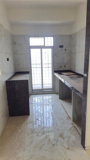Kitchen in 2 BHK Apartment at Shree Nidhi Heights, Mira Road – for Sale