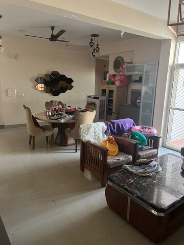 Living Room in 2 BHK Apartment at Logix Blossom Greens, Sector 143 – for Sale