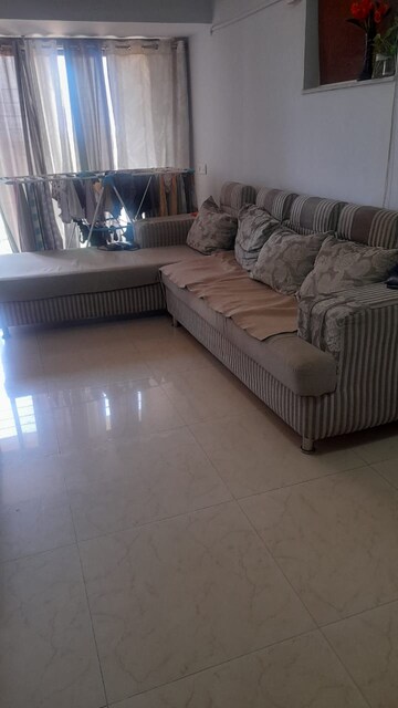 Living Room in 1 BHK Apartment at Palm Spring Centre, Malad West – for Rent