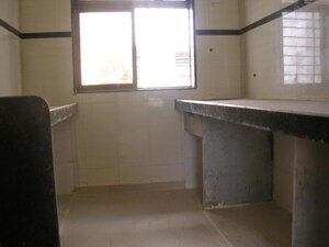 Kitchen in 2 BHK Apartment at Jai Ganesh CHS, Kharghar – for Sale
