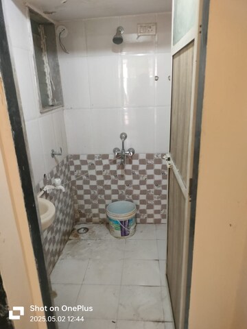 Bathroom in 1 BHK Apartment at Deeplaxmi Shreeji Meadows, Katrap – for Rent