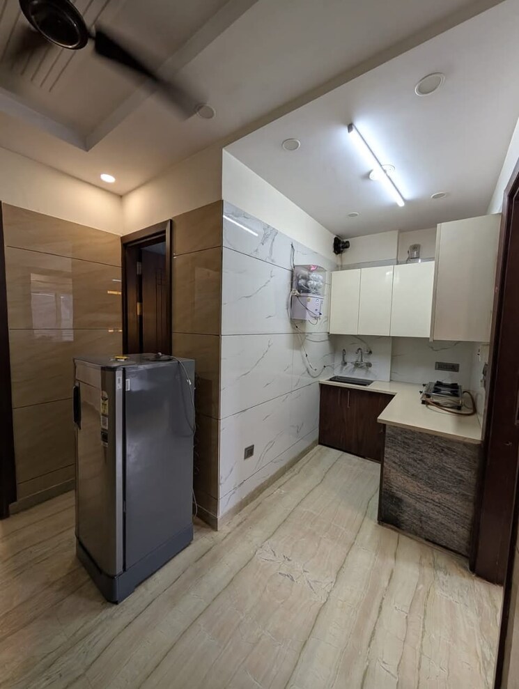 Kitchen, himgiri-enclave 2 Bedroom 450 Sq.Ft. Apartment In Burari Delhi 8670856