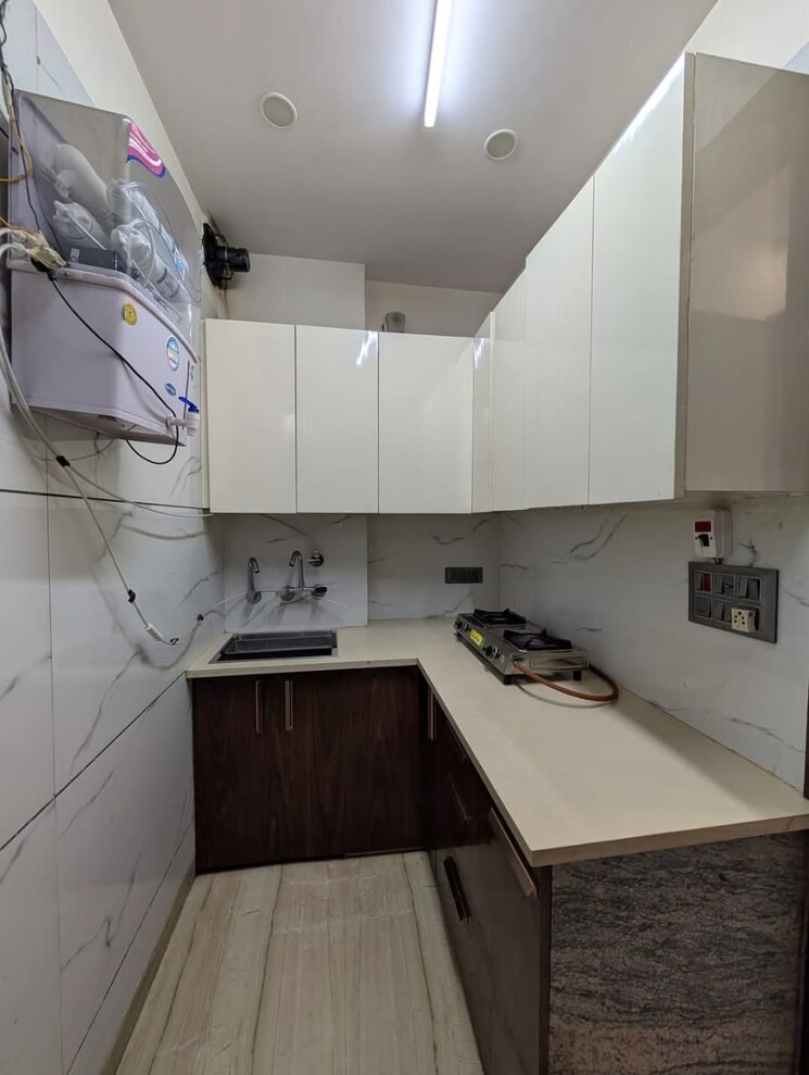 Kitchen, himgiri-enclave 2 Bedroom 450 Sq.Ft. Apartment In Burari Delhi 8670856