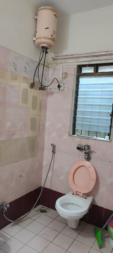 Bathroom in 2 BHK Apartment at Royal Classic Co Op Society, Andheri West – for Rent
