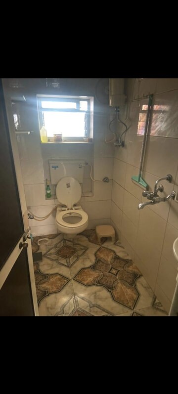 Master Bedroom in 3.5 BHK Apartment at Samartha Ashish CHS, Andheri West – for Rent