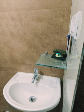 Bathroom in 1 BHK Apartment at Raunak Unnathi Woods Phase 7 A And B, Ghodbunder Road – for Rent