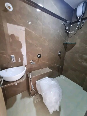 Bathroom in 2 BHK Apartment at Poonam Palash, Nalasopara West – for Sale