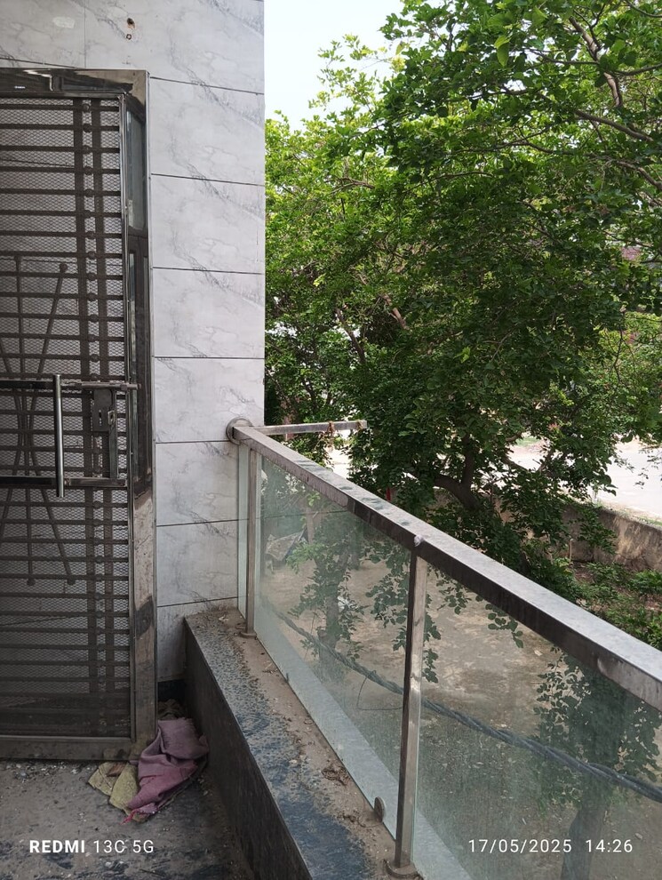Balcony, rohini sector 25 3 Bedroom 870 Sq.Ft. Builder Floor In Rohini Sector 25 Delhi 8671209