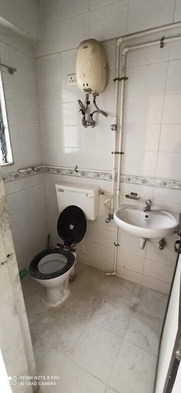 Bathroom in 1 BHK Apartment at Ajanta Heights, Naigaon East – for Rent