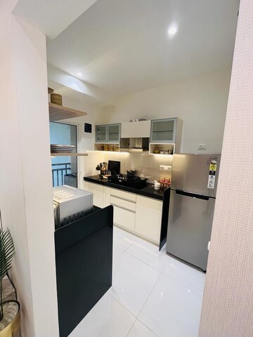 Kitchen in 1 BHK Apartment at Cosmos Orchid, Ghodbunder Road – for Rent