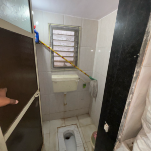 Bathroom in 1 BHK Apartment at Sai Bhavatarini Aashray, Titwala – for Sale