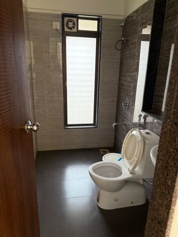 Bathroom in 2 BHK Apartment at Acme Ozone, Manpada – for Rent