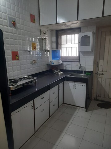 Kitchen in 2 BHK Apartment at Ashram Road – for Rent