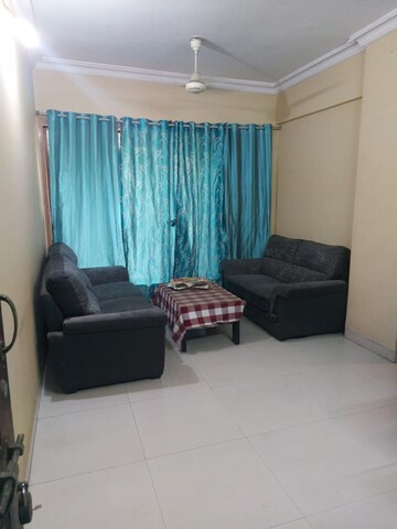 Living Room in 2 BHK Apartment at Tharwani Heritage, Kharghar Sector 7 – for Sale