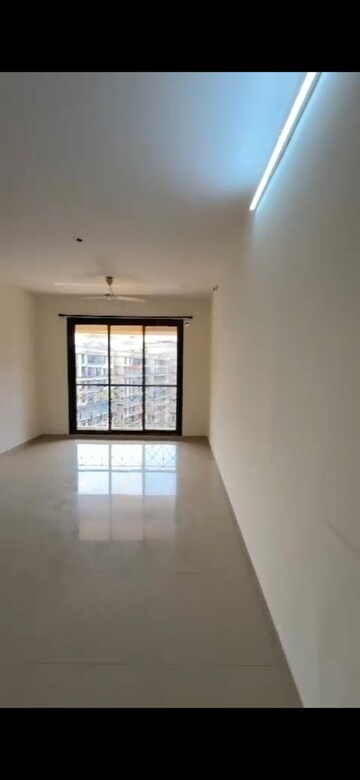 Living Room in 1 BHK Apartment at Nisarg Hyde Park, Kharghar – for Sale