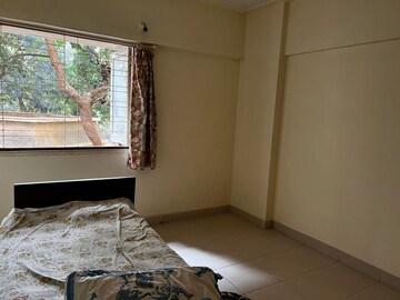 Bedroom in 2 BHK Apartment at Crystal Garden Estate CHS, Manpada – for Sale