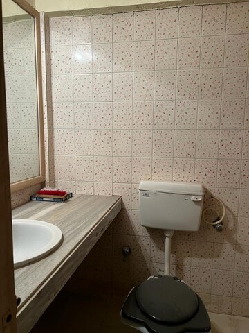 Bathroom in 2 BHK Apartment at Crystal Garden Estate CHS, Manpada – for Sale