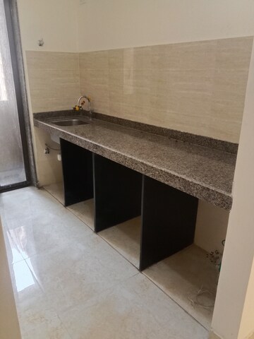 Kitchen in 2 BHK Apartment at Sunteck West World, Naigaon East – for Rent