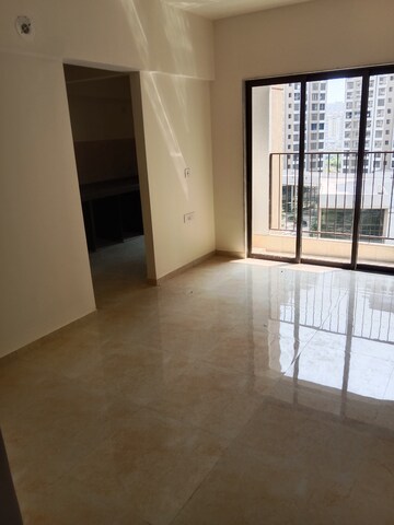 Living Room in 2 BHK Apartment at Sunteck Maxxworld, Naigaon East – for Rent