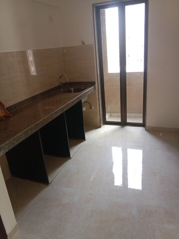 Kitchen in 2 BHK Apartment at Sunteck Maxxworld, Naigaon East – for Rent