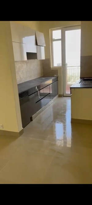 Kitchen in 2 BHK Apartment at Ansal Highland Park, Sector 103 – for Sale