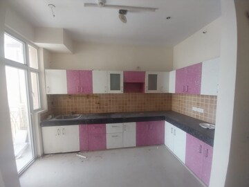 Kitchen in 3 BHK Apartment at Mahagun Mywoods, Sector 16c Greater Noida – for Rent