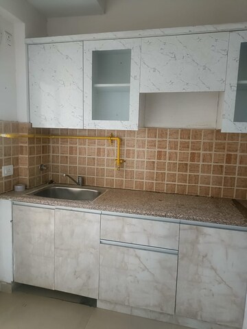 Kitchen in 3 BHK Apartment at Sector 16 Greater Noida – for Rent