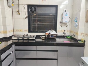 Kitchen in 1 BHK Apartment at Silver Bells CHS, Dahisar West – for Sale