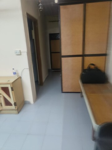 Living Room in 1 BHK Apartment at Manish Garden CHS, Andheri West – for Rent